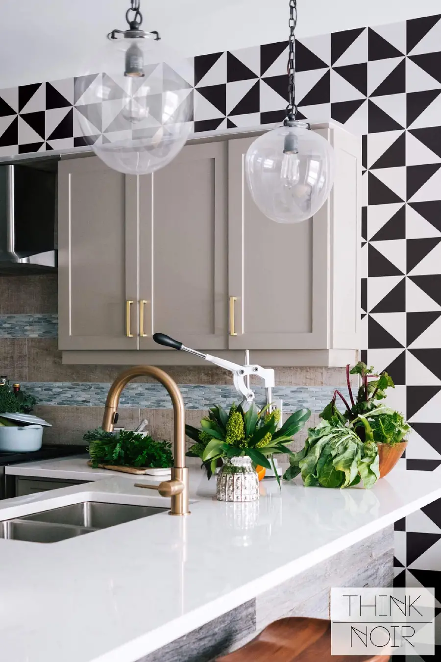  Beautiful background of a modern kitchen with a beautiful black and white poster 