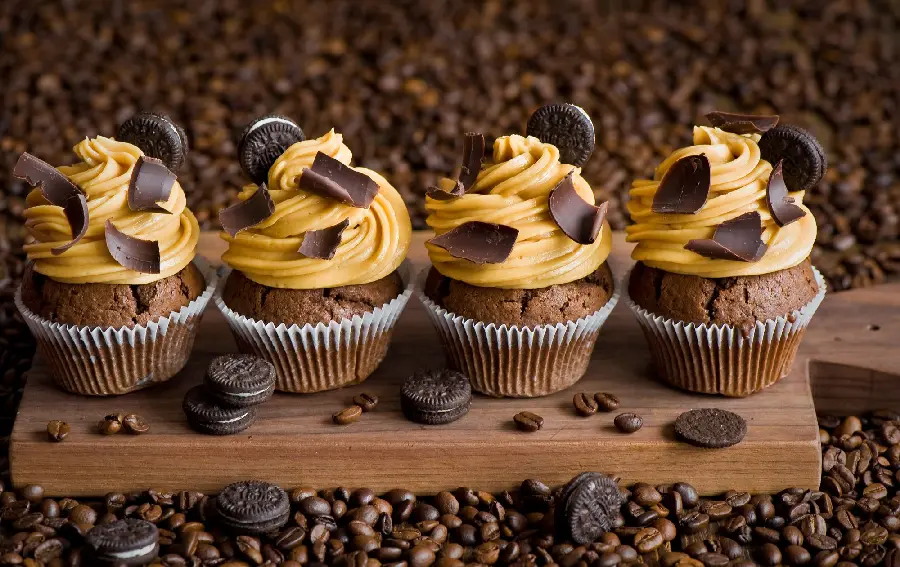 Photo of four delicious cocoa cupcakes with excellent quality