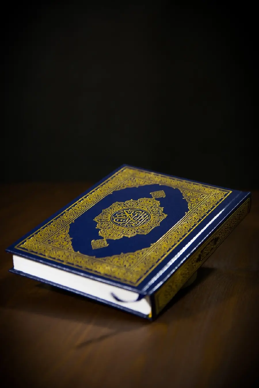 A very beautiful background of the Holy Quran with a blue cover 
