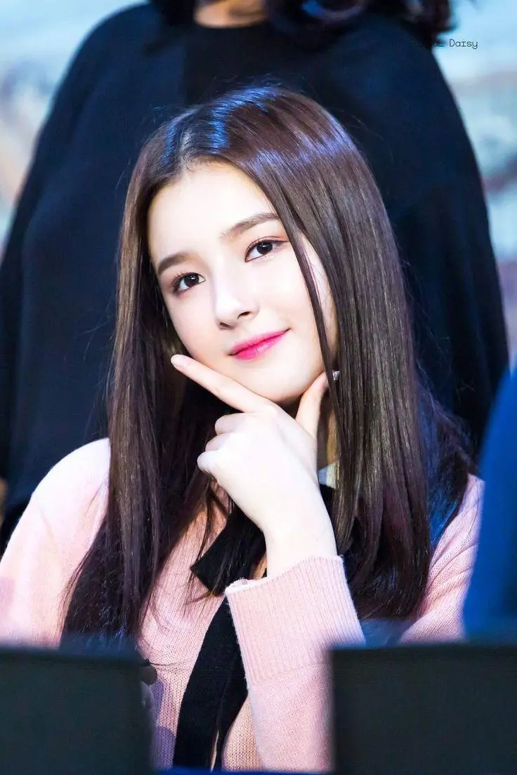 A wonderful and attractive wallpaper of Nancy with a cute pose
