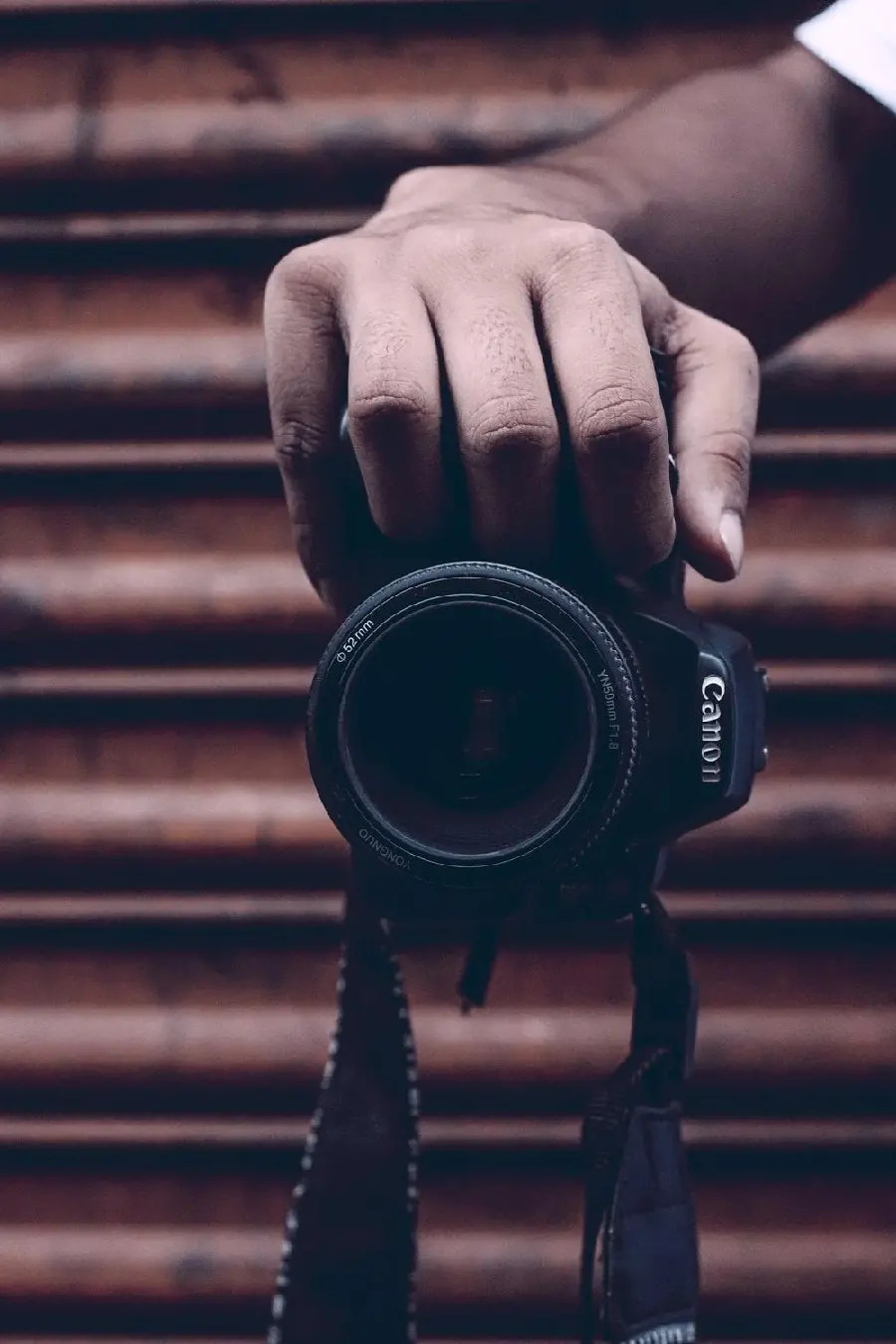 New and free stock image of a hand with a camera in full HD quality 