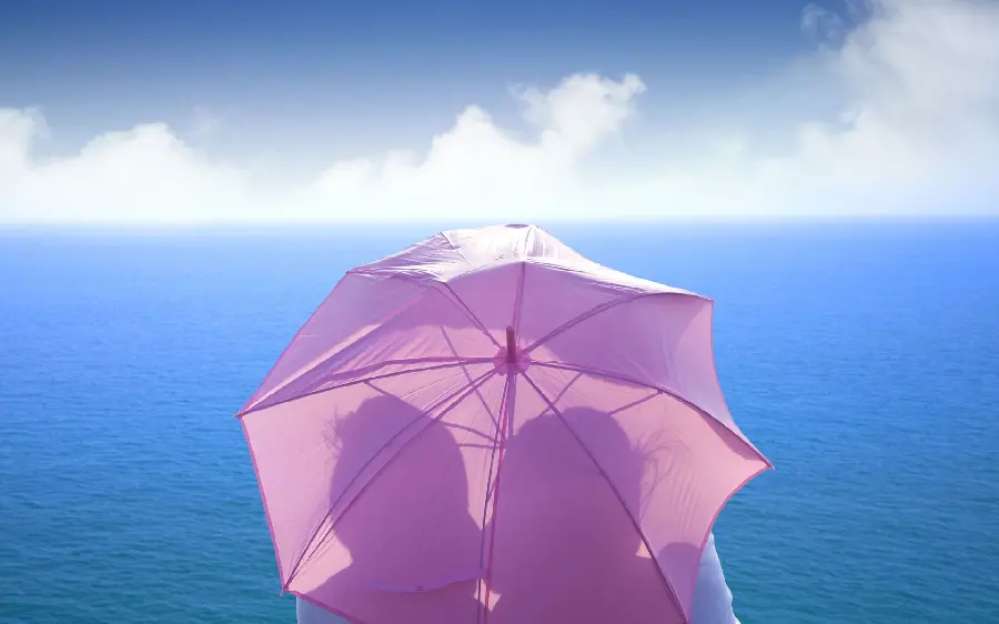 Download a beautiful umbrella photo by the beach with clean air 