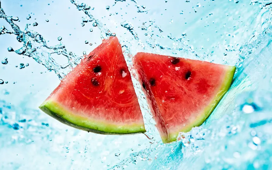 Amazing wallpaper of watermelon slices in water