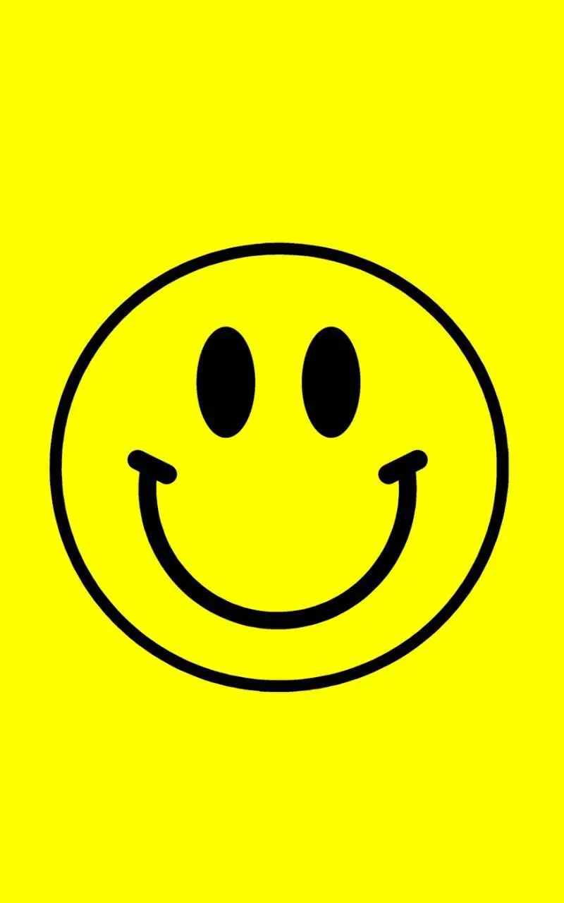  Beautiful photo of a simple yellow smiling emoji and googly 