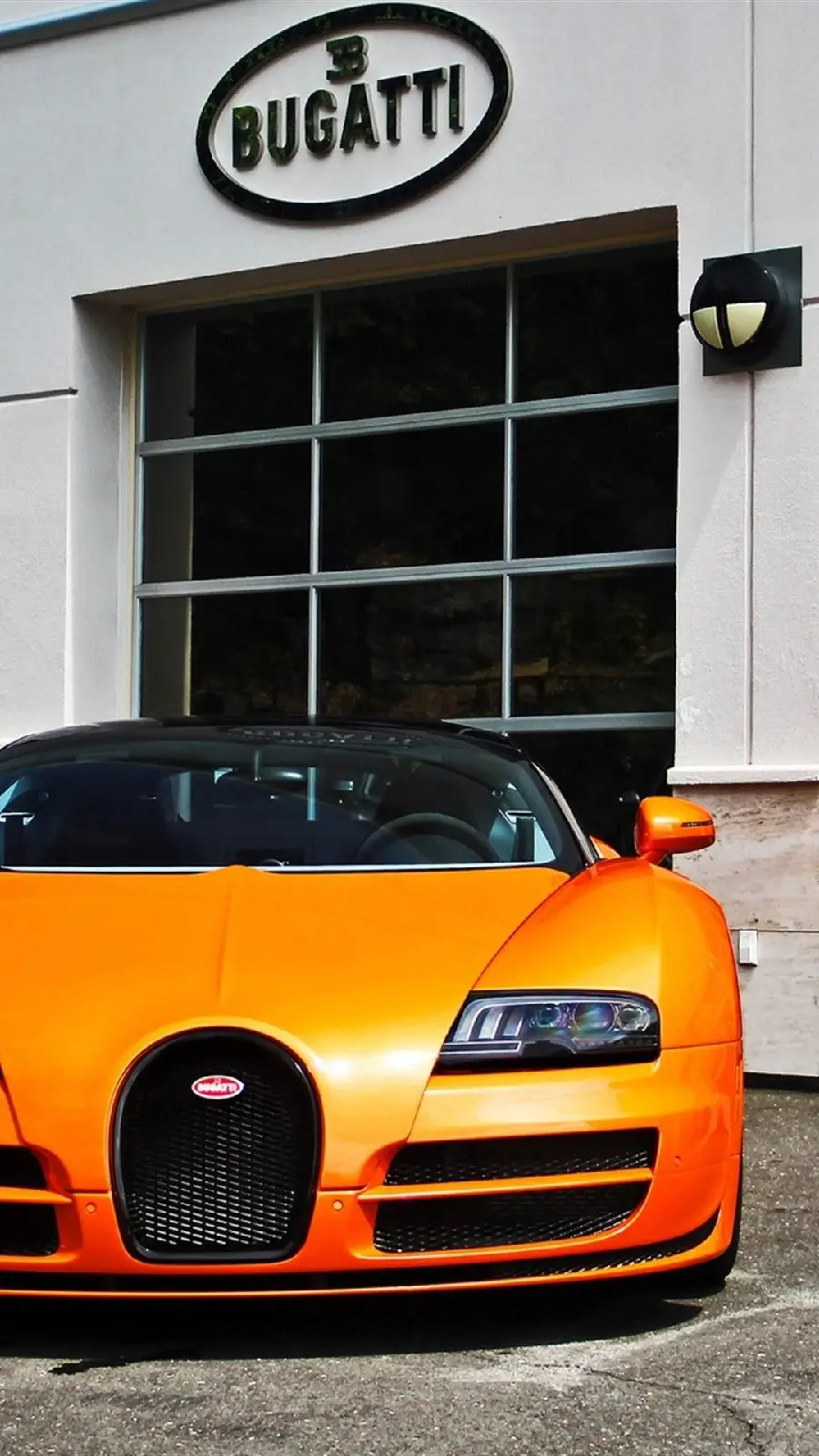 Amazing background of an aristocratic orange Bugatti car for mobile