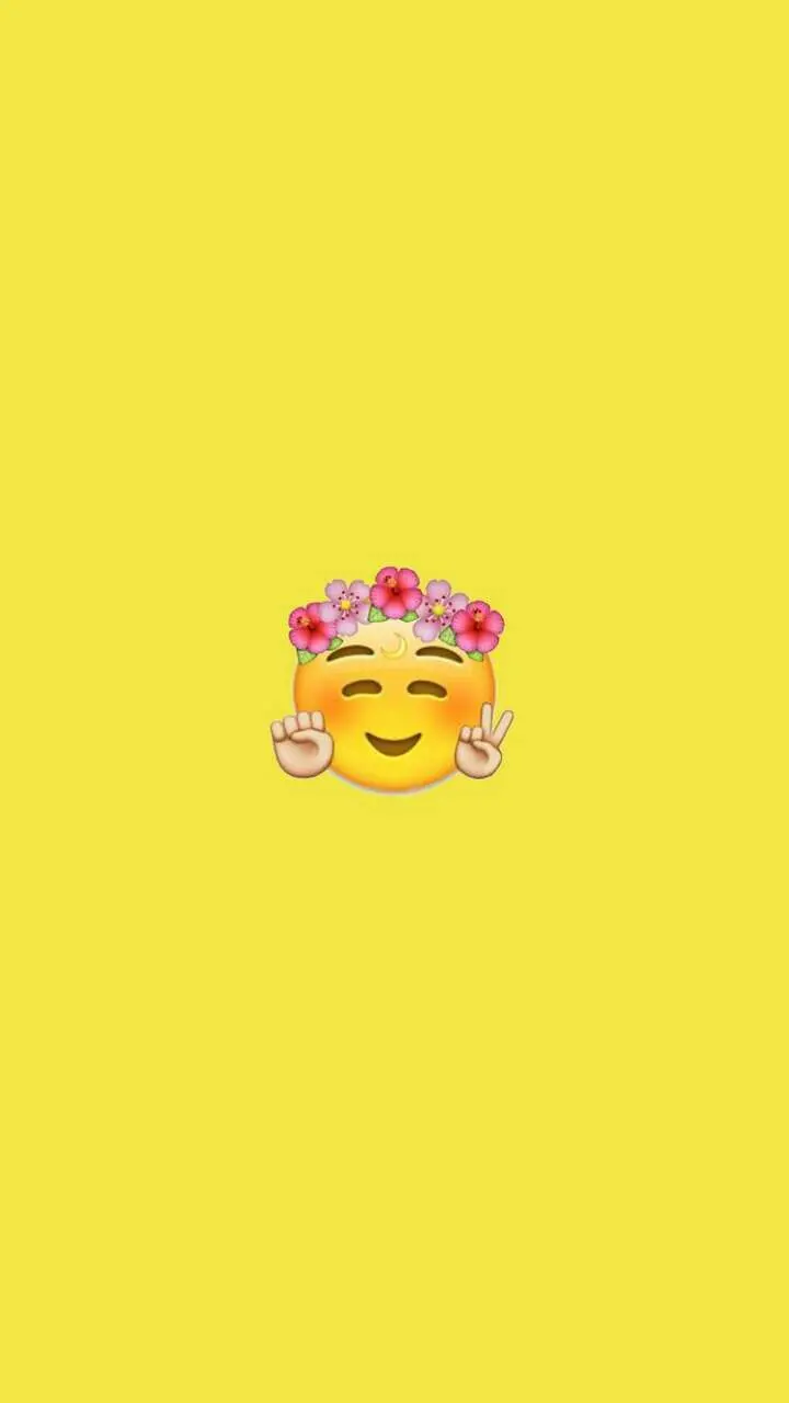  Cute wallpaper of a beautiful and beautiful emoji with pink flowers on its head 