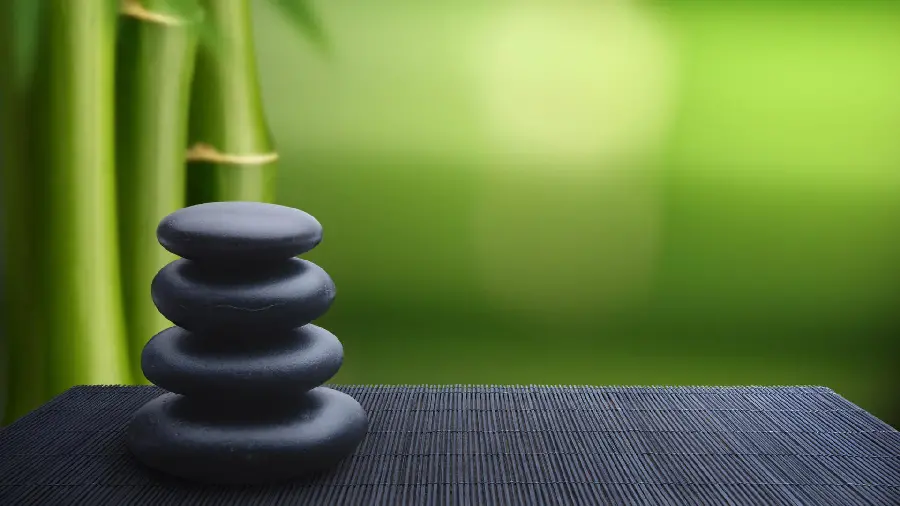 Spectacular stock photo of stacked Zen stones in black 2023