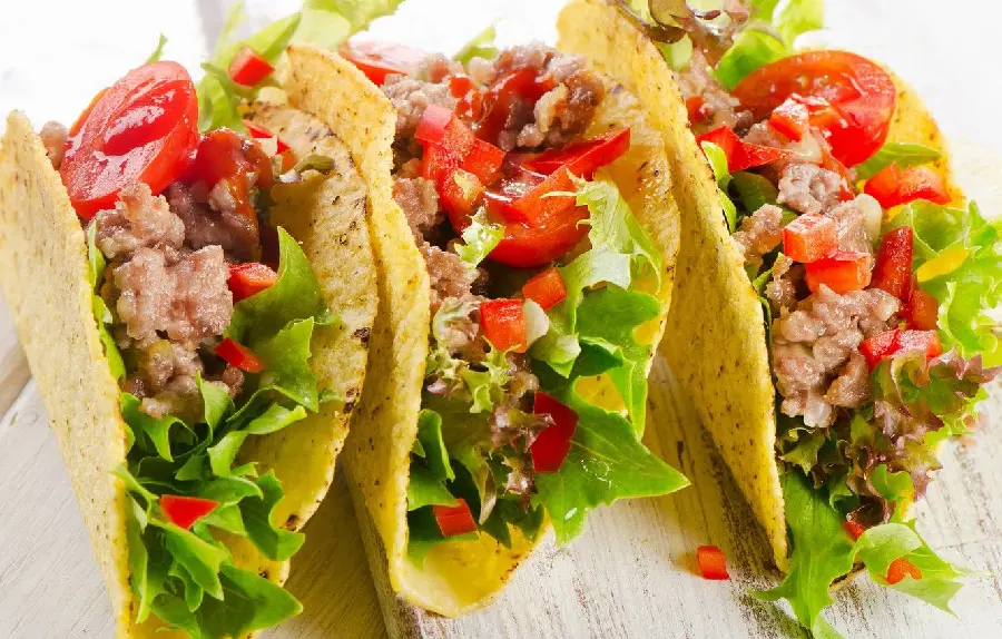 Photo of incredibly delicious Mexican tacos with various vegetables
