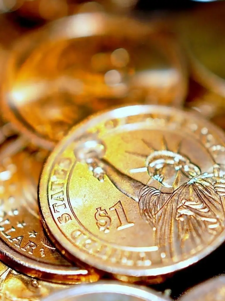 Photo of US and Canadian dollar coins with the highest quality 