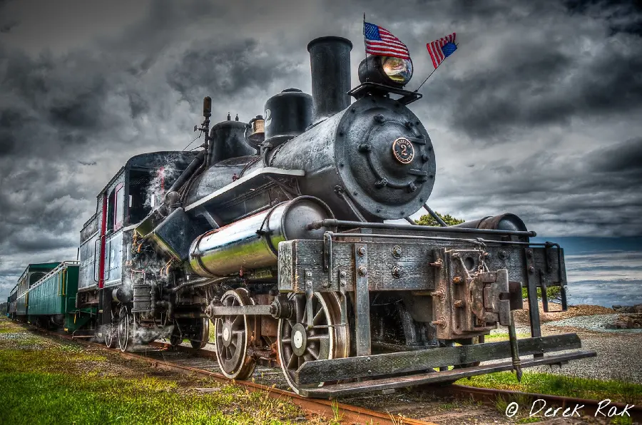 Close-up photo of an old American train locomotive on a special track
