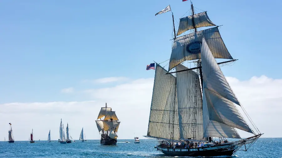 Extraordinary and dreamy photo of a large boat with big sails 