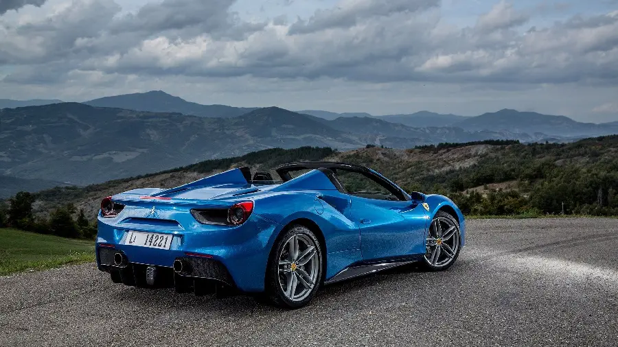 Enchanting Wallpaper of the Ferrari 488 Spider in Stylish Blue