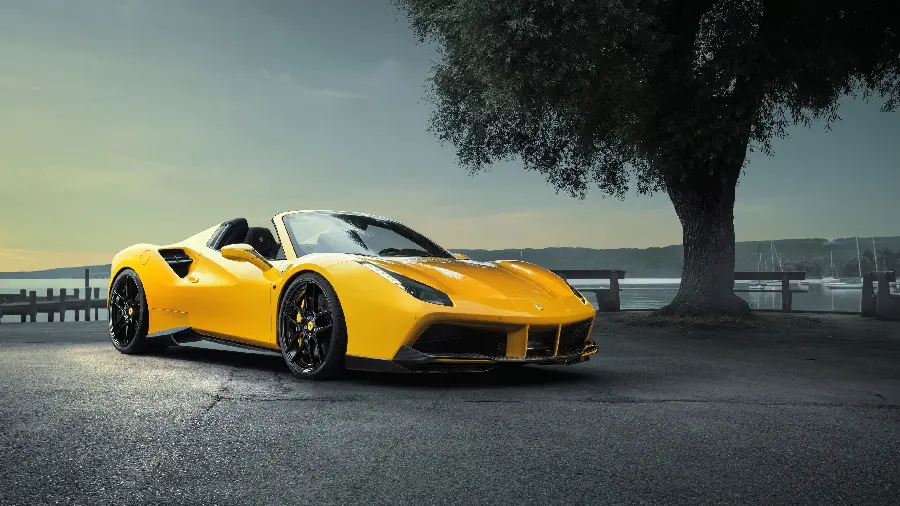 Download the dreamy yellow Ferrari 488 Spider wallpaper for your tablet