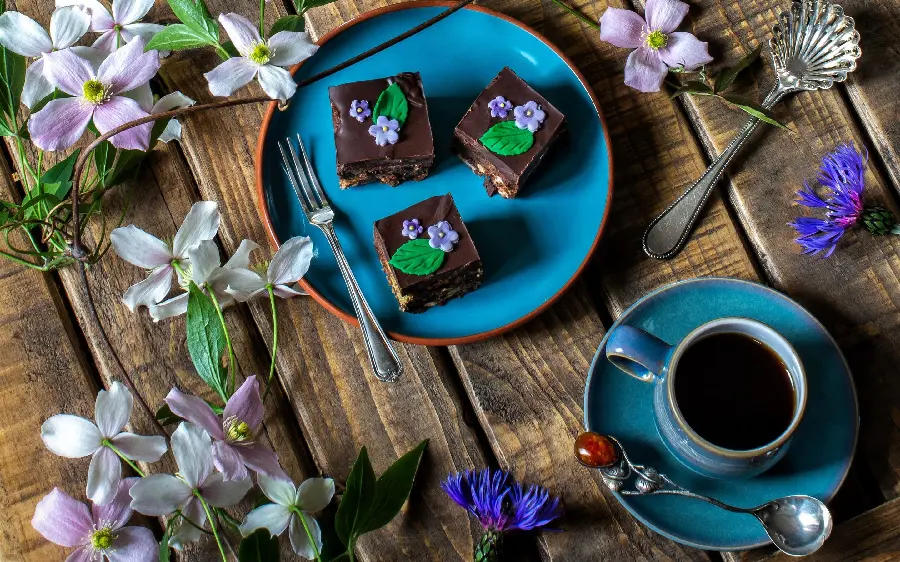 Awesome and spectacular image of chocolate cake in blue dishes 