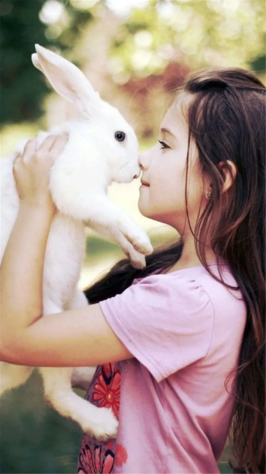 Stylish and friendly background of a little rabbit girl in an embrace
