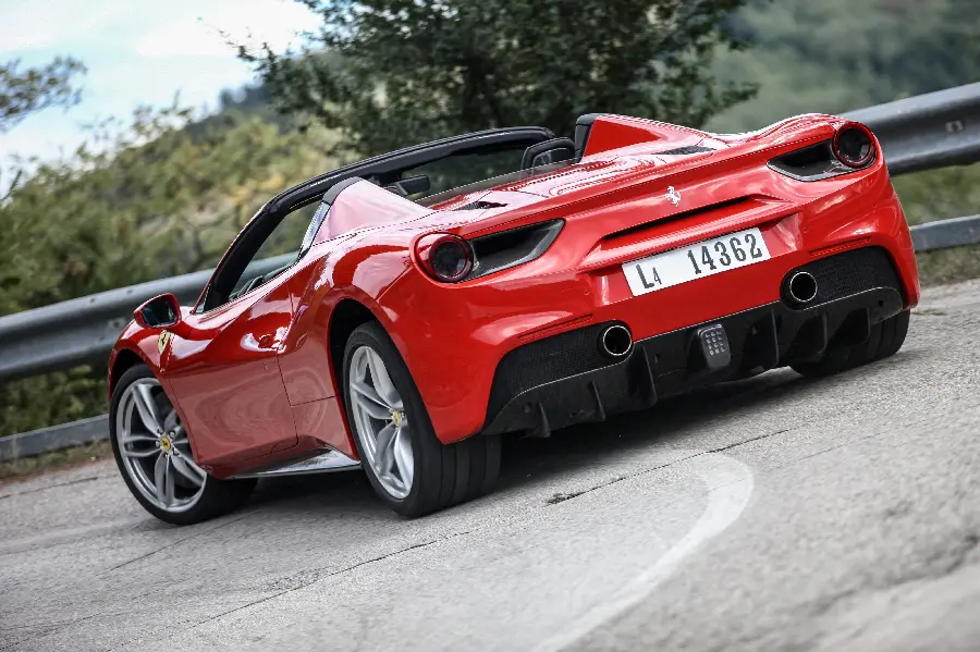 Cool wallpaper of a red Ferrari 488 on the road in spectacular quality