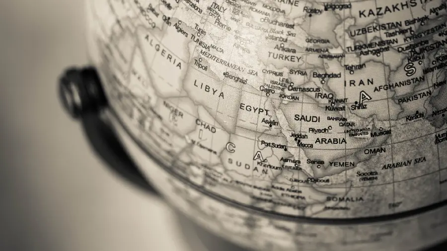 Beautiful and old-fashioned black and white wallpaper of a spherical map of the Earth