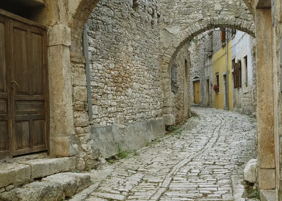 Relaxing background of old stone alleys with an interesting domed roof