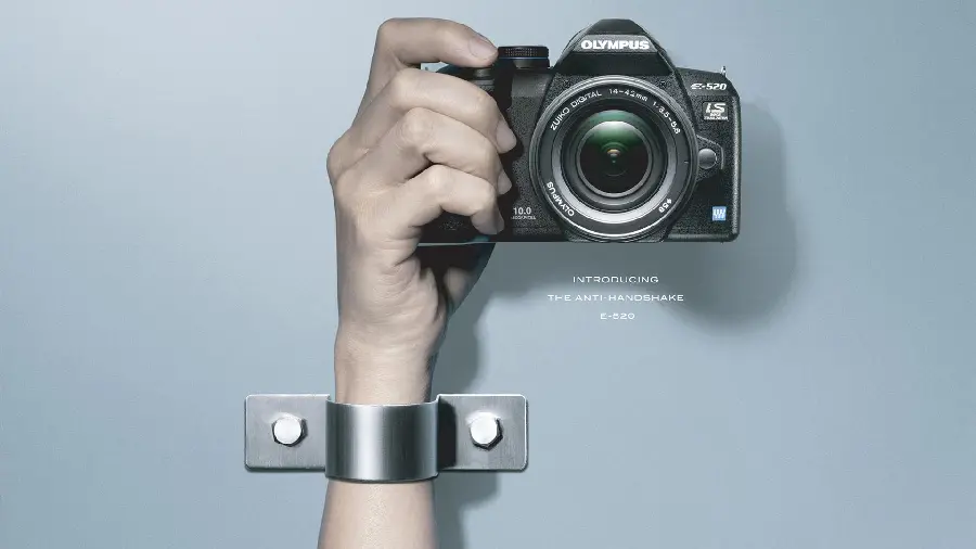 Background and profile photo of a hand with a camera and a background for artistic photographers 