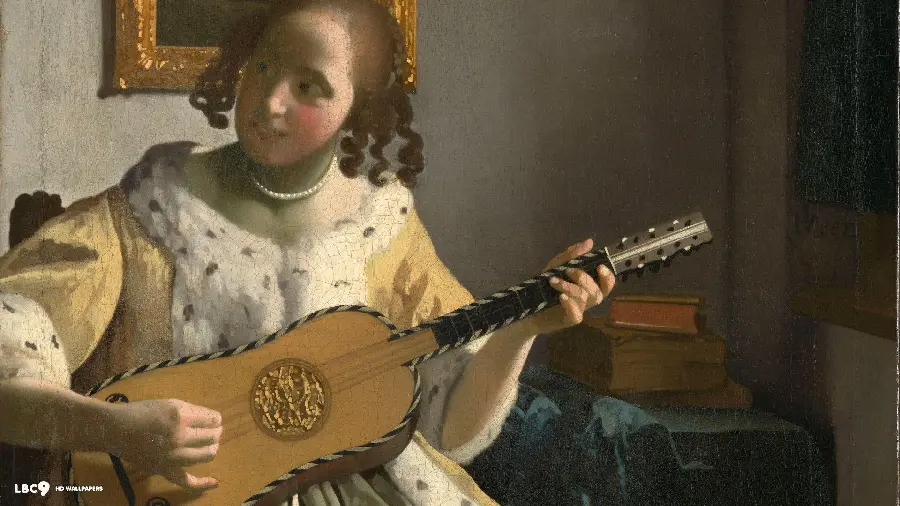 Photo of a painting of a guitar player by Johannes Vermeer, the famous Dutch painter 