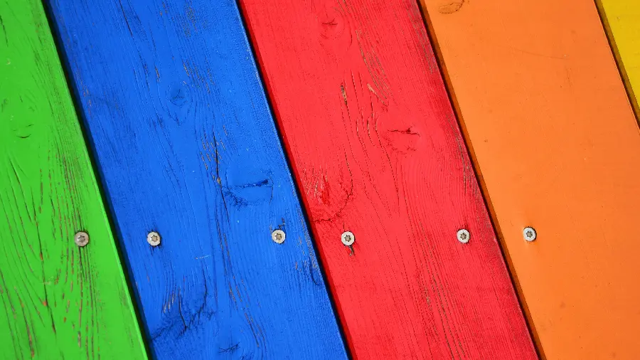 A cheerful and enchanting background of colorful and bright wooden planks in full HD quality