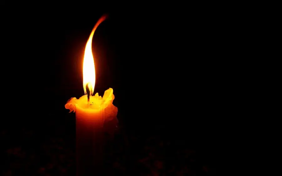 Bright Condolence Candle Wallpaper Without Text On Black Background