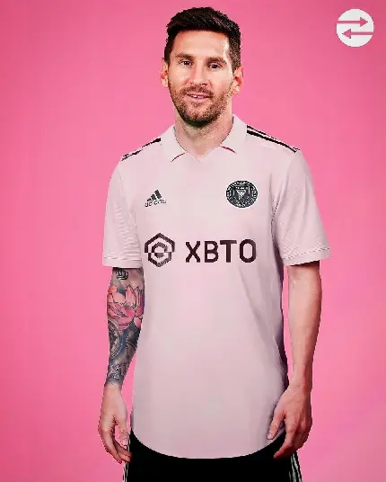 Download a beautiful wallpaper of Messi in a pink dress and excellent quality