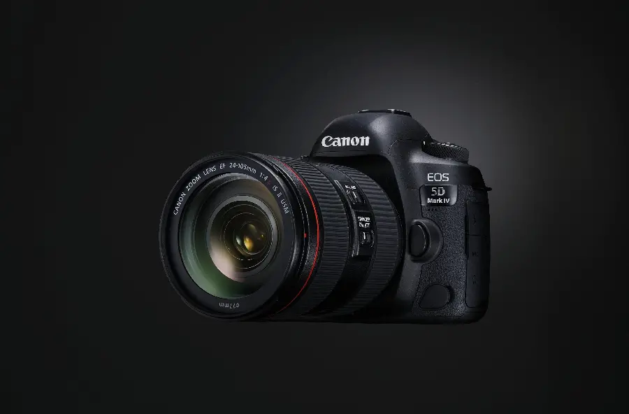 Stock image of Canon EOS 5D camera with microphone and headphone inputs, one of the most versatile cameras produced in recent years
