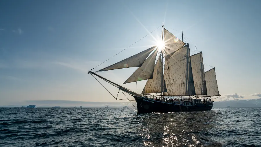 Wallpaper of a large sailing ship on the calm waves of the sea in HD quality