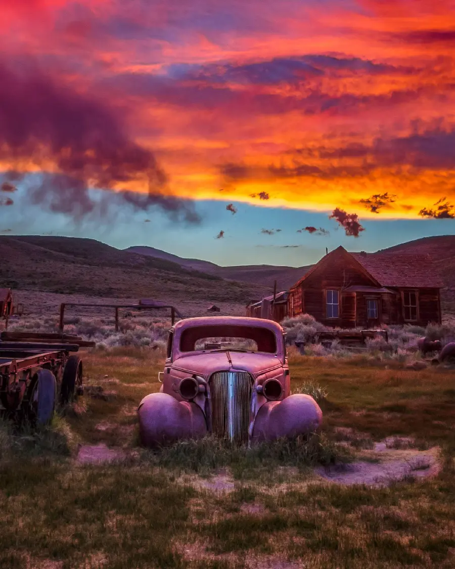 Glowing Sunset Wallpaper Over Rusty 1937 Chevy