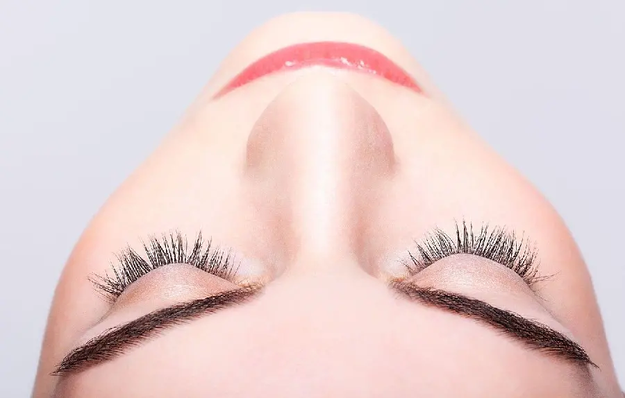 Download HD stock photo of a woman with beautiful long and thick eyelashes suitable for printing advertising posters 