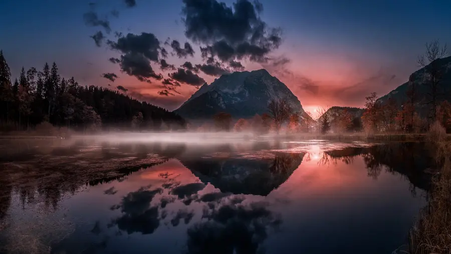 Image Attractive background of a foggy pink horizon of a cold snowy mountain with high resolution and HD quality