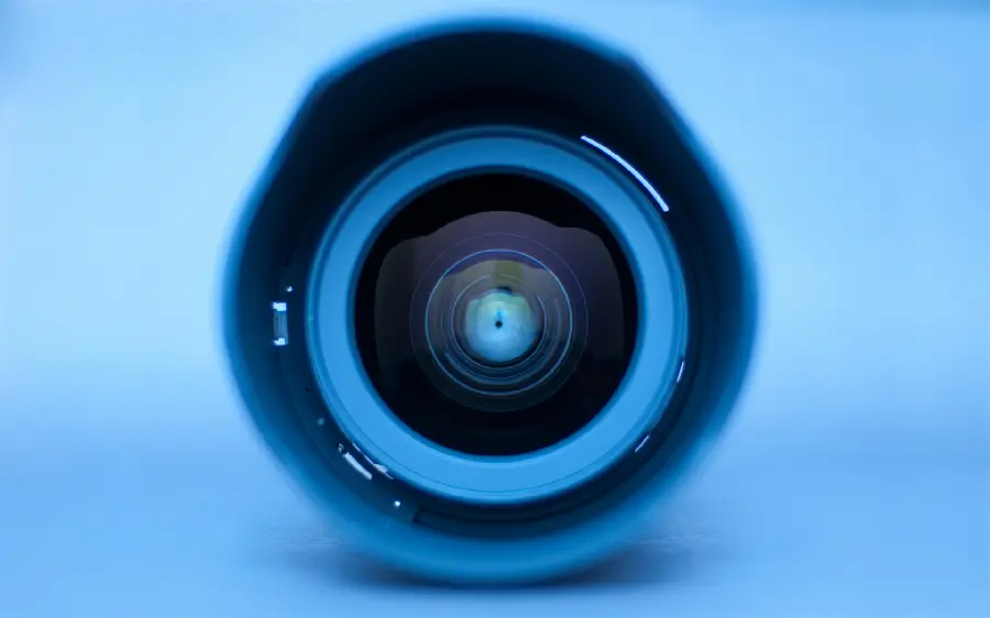 Digital background of camera lens in the background of follow for Instagram story highlights