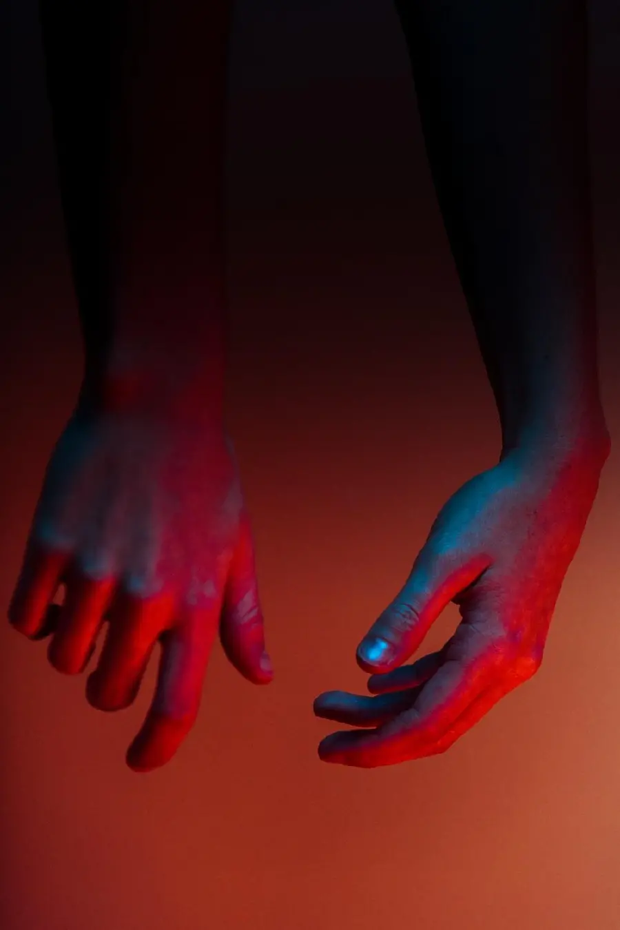 Download photo of bloody hands with red background 