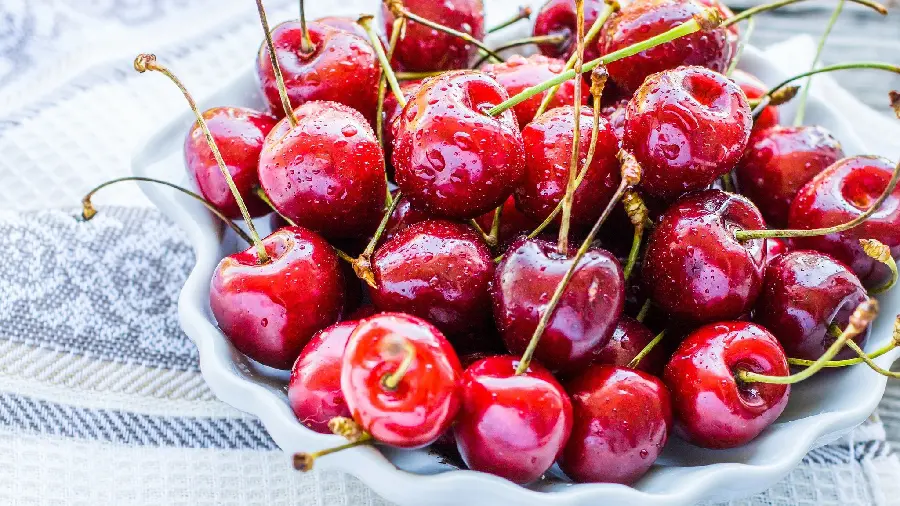 Free high quality photo of a bowl full of sweet red cherries