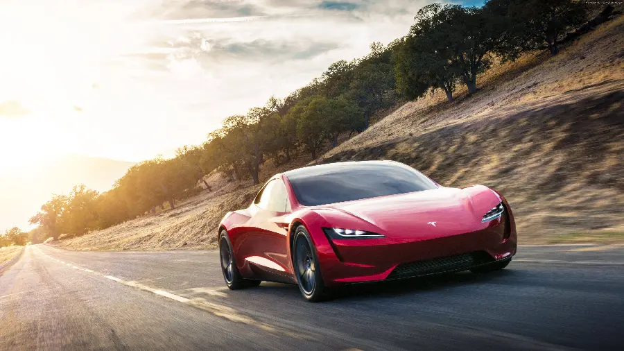 Free download of a high-quality red electric car photo on the road 