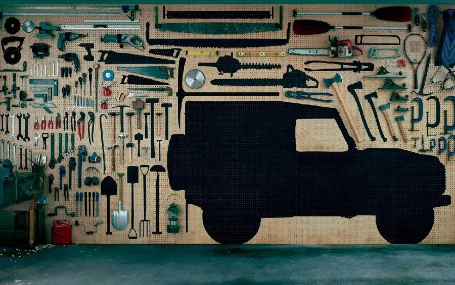 Computer graphic design of a garage and car repair shop with wall-mounted tools 