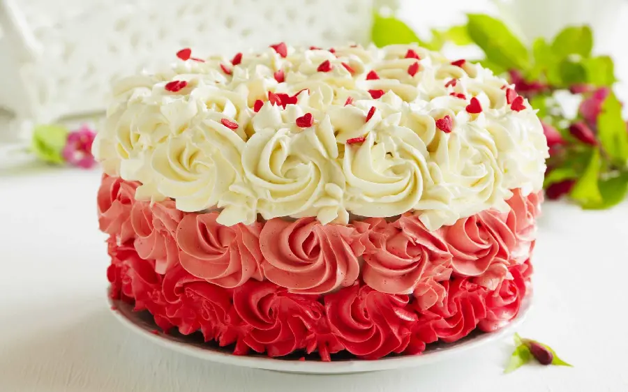 The latest wallpaper of a multi-layer cake with plenty of cream