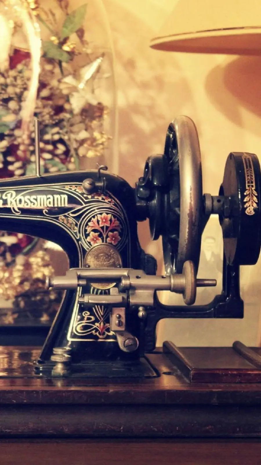  Background of a sewing machine from a half view for the phone 