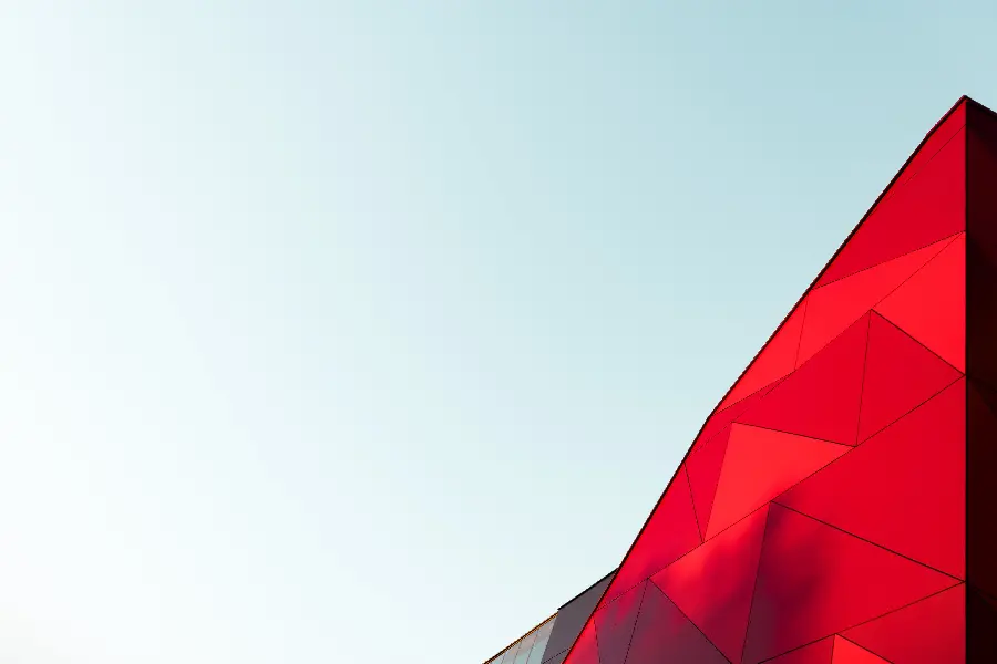 Photo of a red building designed in a minimalist style