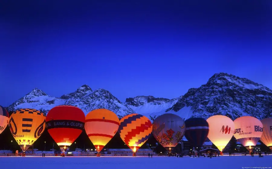 Dreamy Night Photo of Snowy Mountain with Hot Air Balloons High Quality