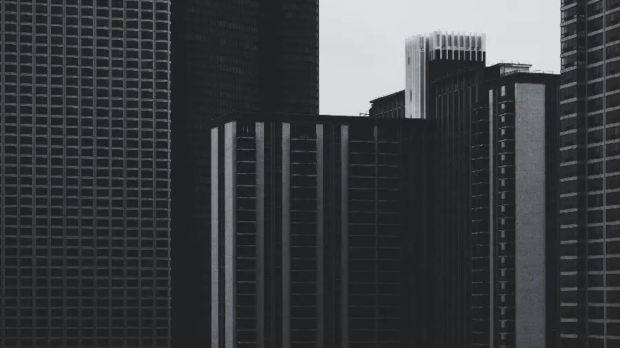 Dark theme wallpaper of lifeless minimalist buildings