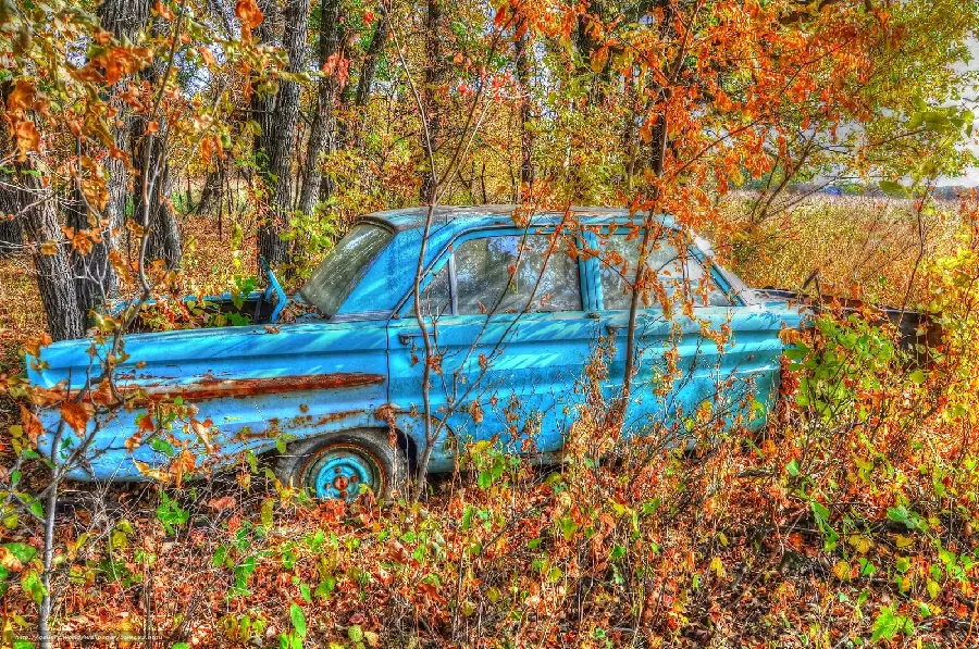 A professional digital painting of an old abandoned car