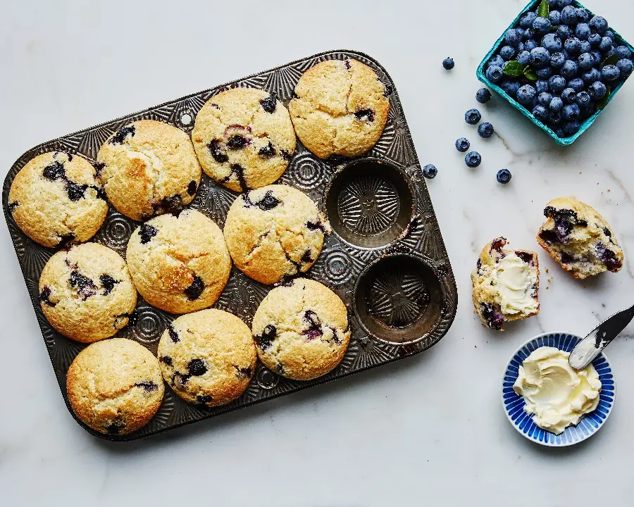 Download stock photo of blueberry muffin arranged on a tray