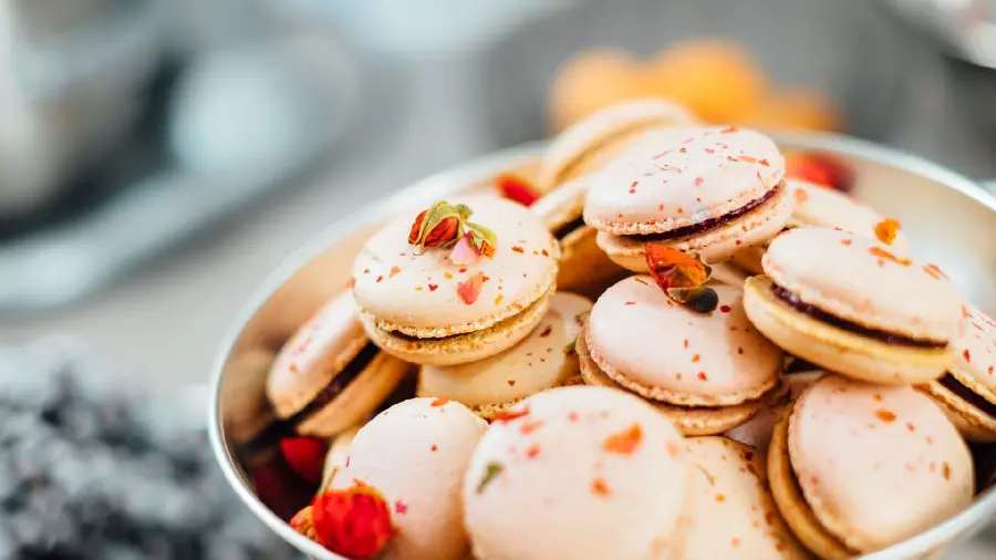 Background photo of baking ingredients for cakes and sweet pastries Small round sweets background for advertising banner printing