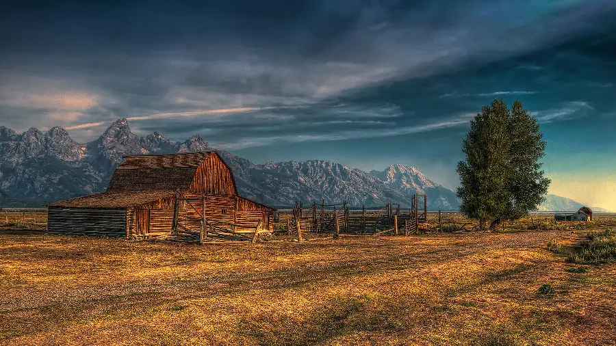 Cool Stock Photo of a Barn with a Majestic Mountain Background