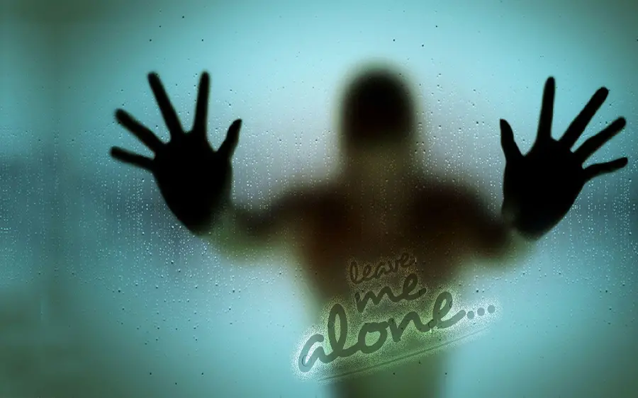 Scary profile picture of sadness and loneliness of a man behind the glass 