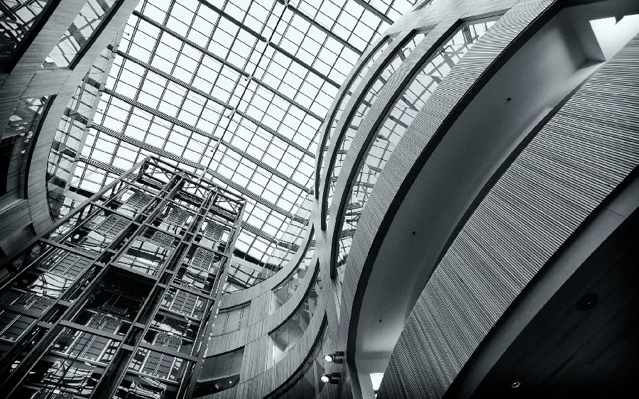 Black and white image of giant steel building