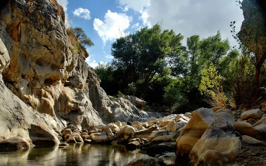 Stock of a natural attraction of a spring among strange rocks