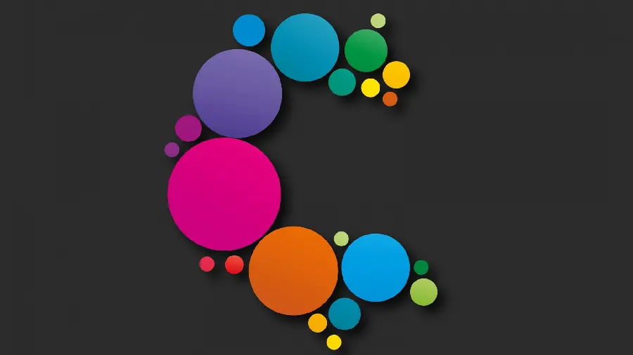 Wallpaper with a design of colored circles on a simple background for the desktop